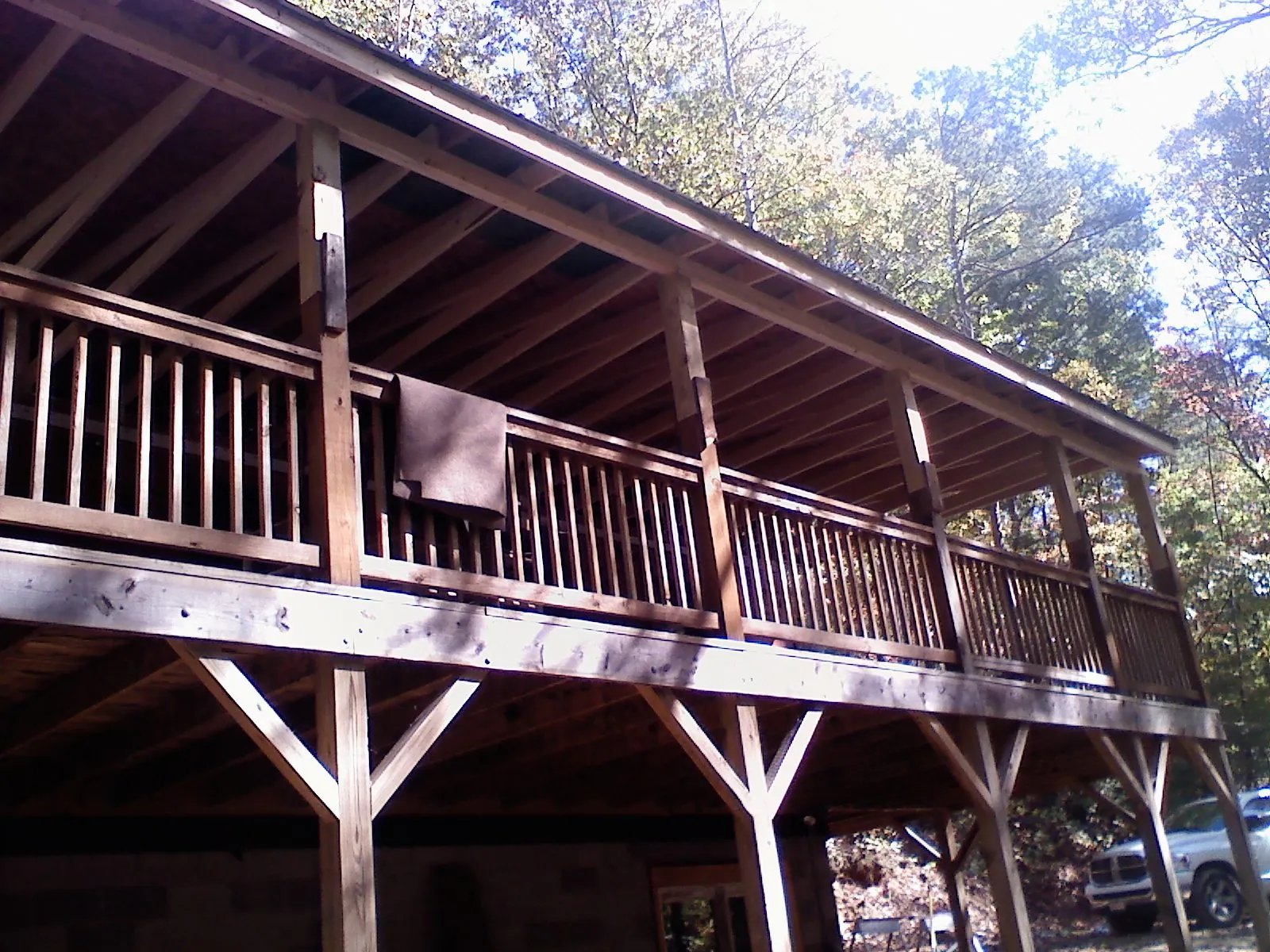 Timber framing under a new elevated porch and deck — Roof Leak Repair in Vicksburg by Roofing Brothers